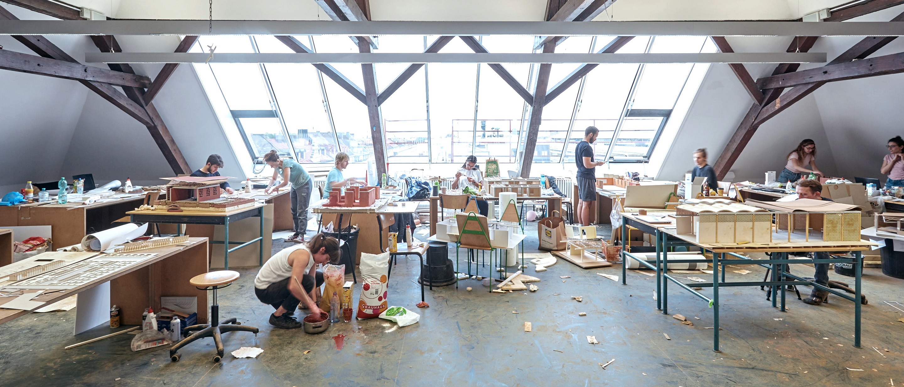 architecture students working on projects at a studio